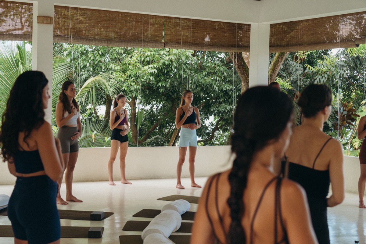 Yin yoga vs vinyasa — a still, passive hold and a flowing practice at Lanka Yoga, Sri Lanka
