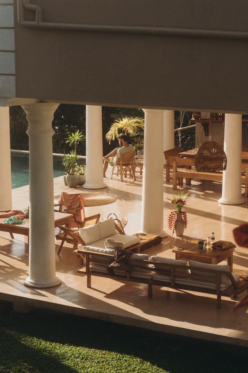 The open-air lounge and pool deck at the Lanka Yoga campus on Koggala Lake, Sri Lanka