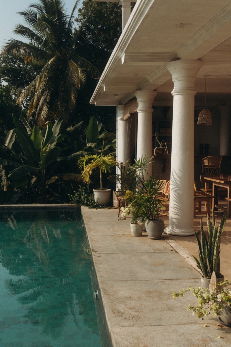 The pool and open-air colonnade at the Lanka Yoga campus, Sri Lanka