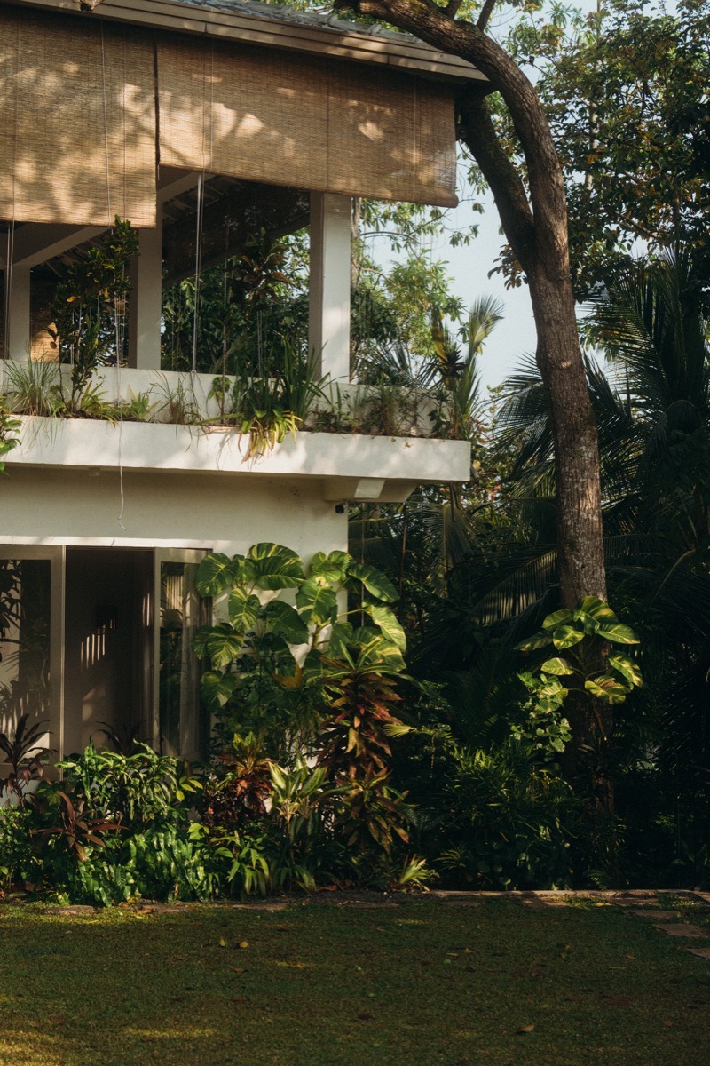 Lakeside accommodation surrounded by tropical garden at Lanka Yoga, Sri Lanka